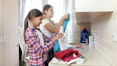 4K美丽的微笑女孩帮妈妈洗衣服做家务的镜头